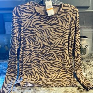 Long sleeve Michael Kors shirt never worn.  Tags still on it.  Size small